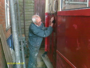 Bob preparing for the second coat of gloss - Coach 7