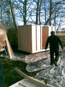 Main structure in place (ground protection in evidence)