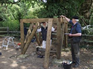 James fiddling with small pieces of wood - avoiding the real work, as usual