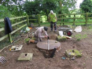 John B (yes, we do seem to have a lot of Johns) making the well cover locking system
