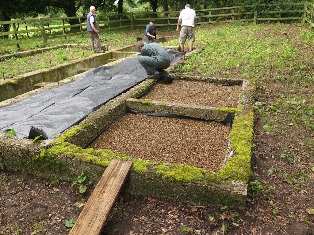 Loco shed annexe - floors covered with terram and shingle (far one is ...