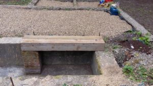 Trial (temporary) placing of timber, along three-foot-gauge pillars in inspection pit